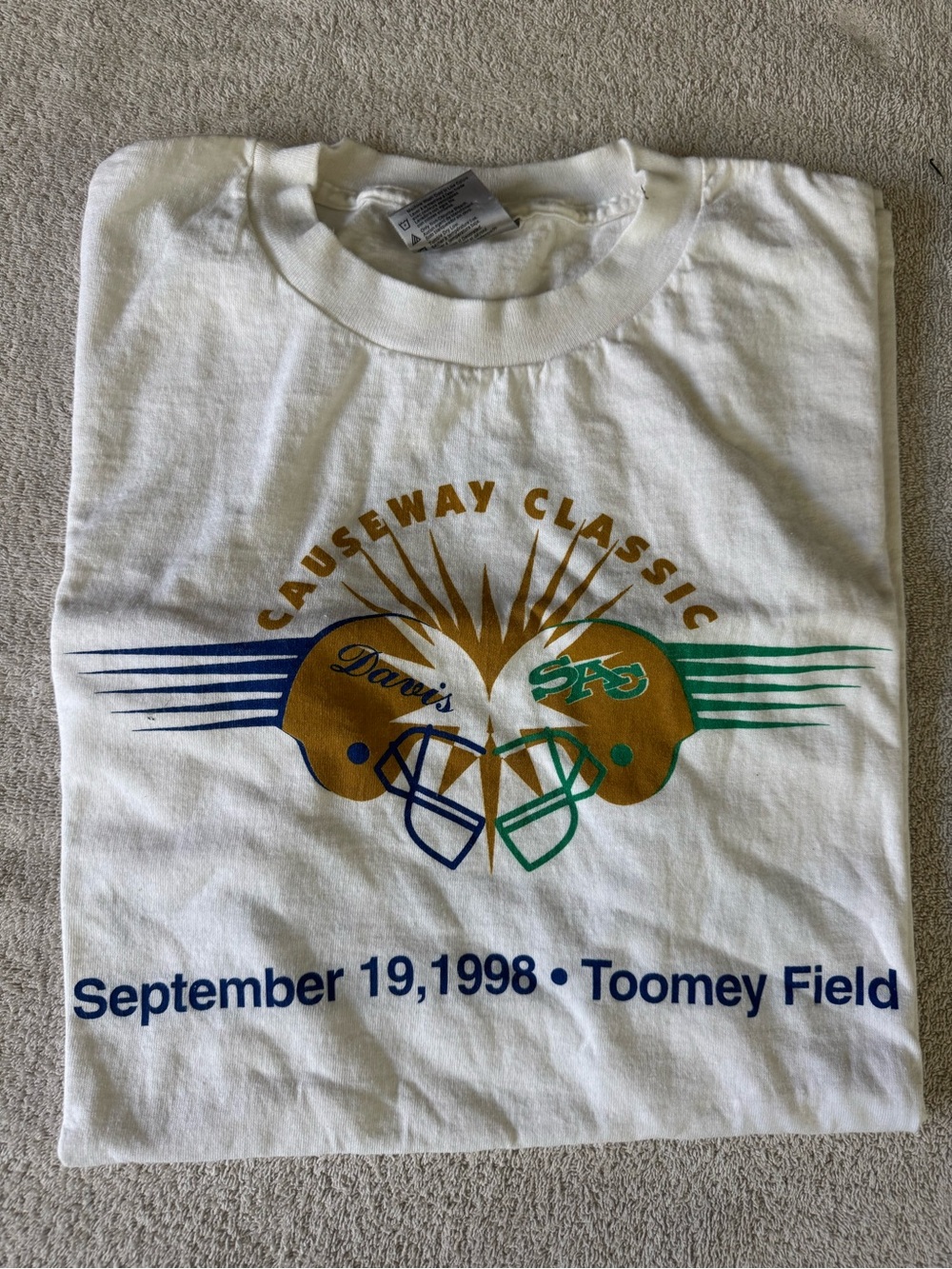 Causeway Classic 1998 Graphic Tee in White with Gold & Blue